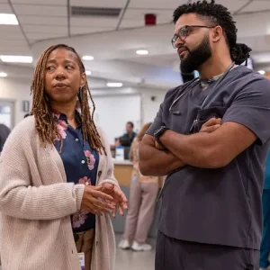 Krystel McNeil plays social worker Kiara Alfaro (left) On "The Pitt." (Photo: HBO Max)